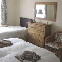 The family bedroom: light and airy, the family bedroom has a king size bed, a single bed